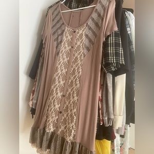 Has two little holes from when tag was taken off